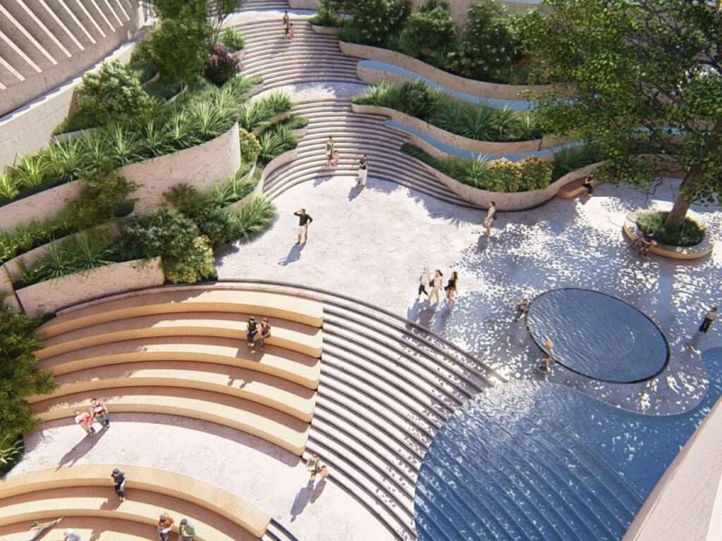 Sunlit sunken courtyard and terraced amphitheater steps at Shenzhen Natural History Museum.