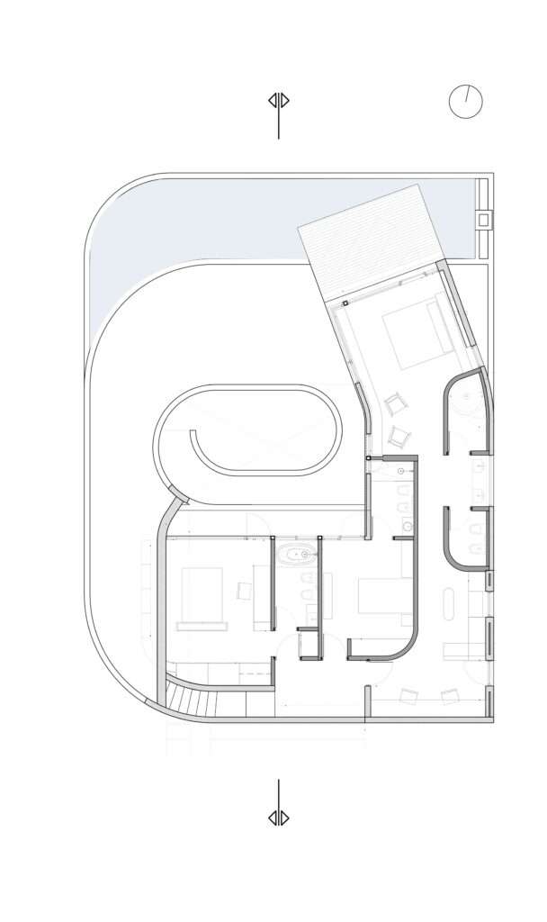 A detailed architectural technical drawing of the first floor, showcasing the private bedroom suites oriented along the curved perimeter.