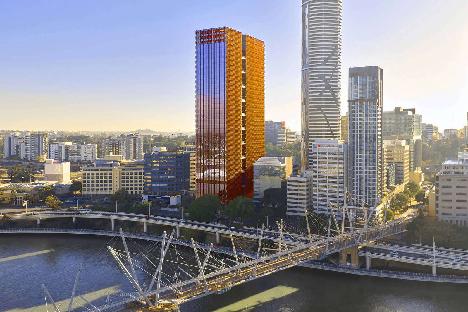 High-angle view showing 205 North Quay tower within the Brisbane cityscape along the river
