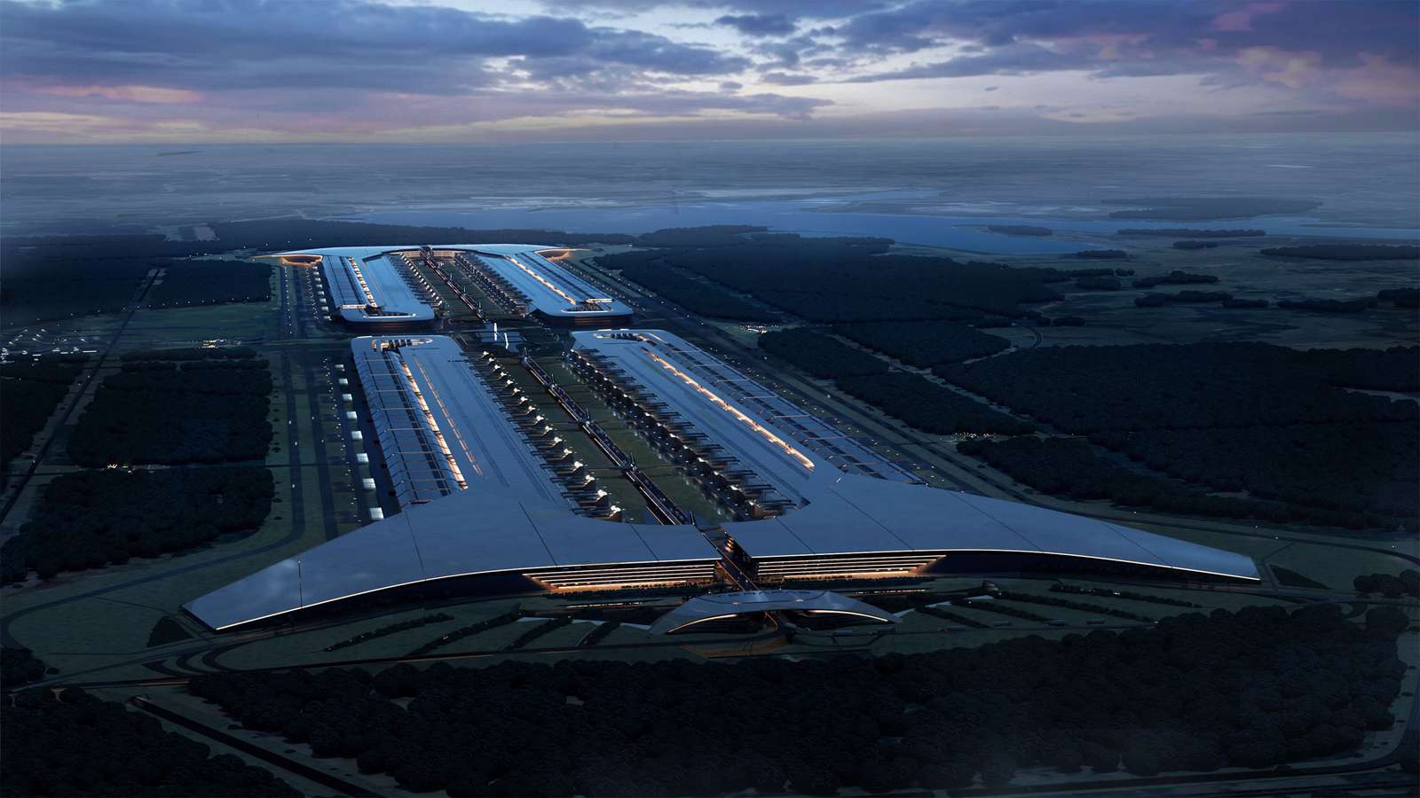 Aerial rendering of the expansive Terafab complex at dusk, showing symmetrical factory wings and central circulation.