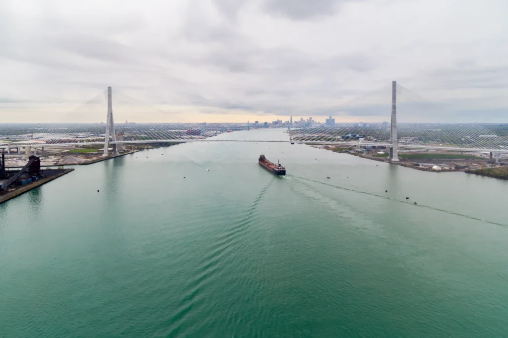 Close view of vertical pylon towers supporting stay cables connected to the main bridge deck structure.