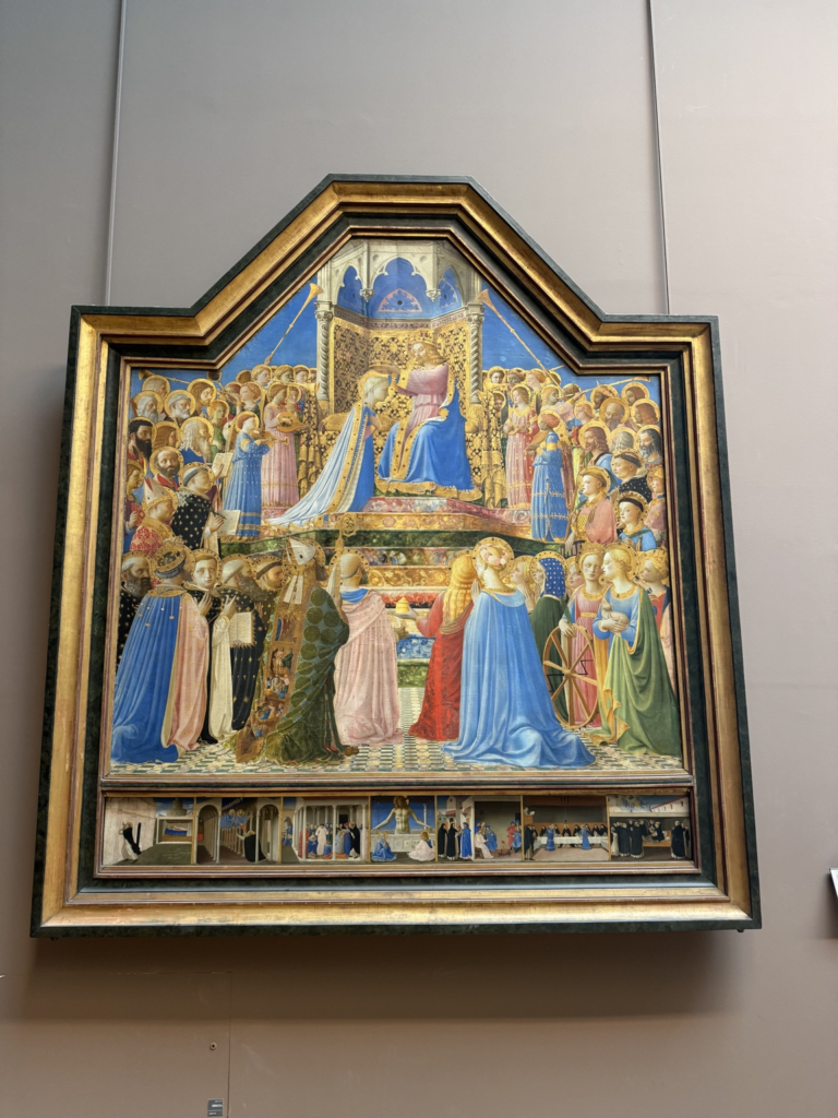 Fra Angelico's altarpiece The Coronation of the Virgin, featuring a central scene of Christ crowning the Virgin Mary on a gothic throne, surrounded by saints and angels with golden halos, with a predella of smaller narrative scenes at the bottom.