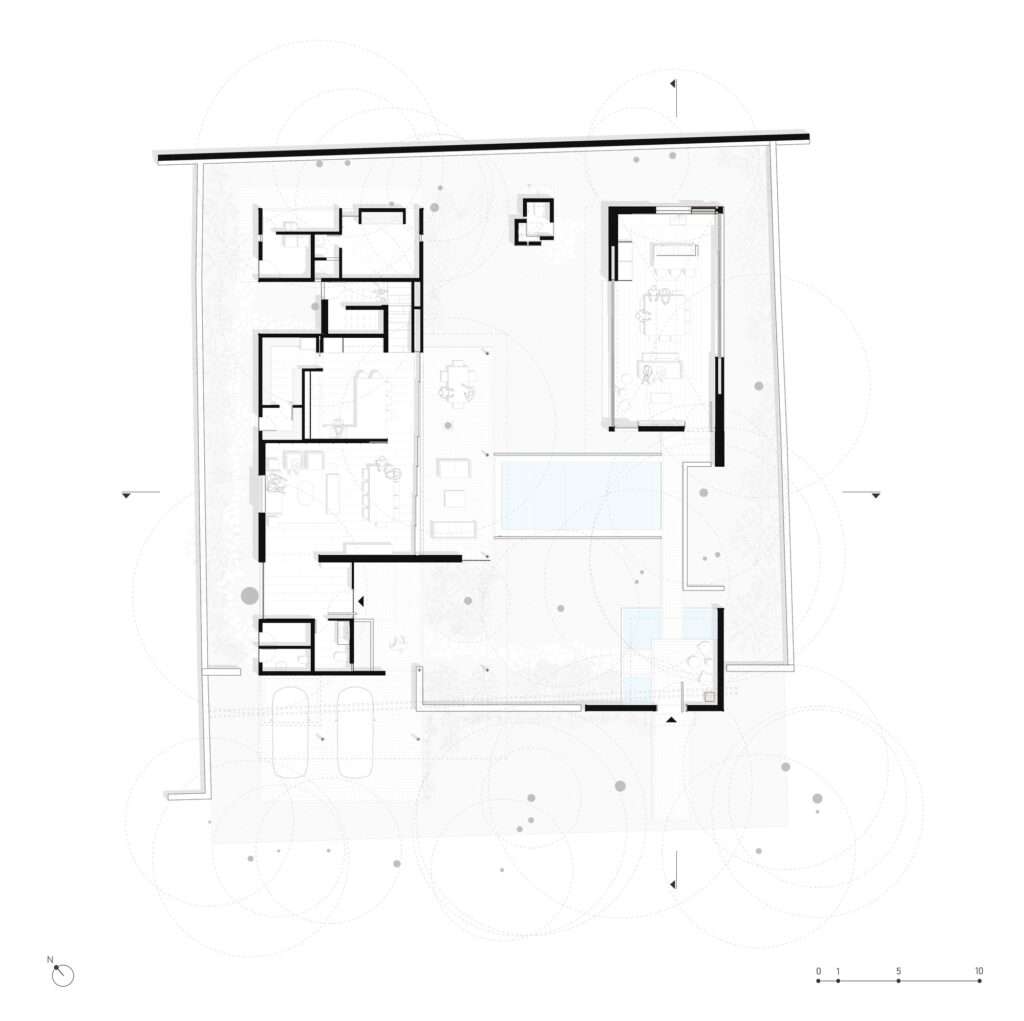 Architectural master site plan drawing of Casa Sudzal showing pavilion layout, central pool, water channels, and preserved trees.
