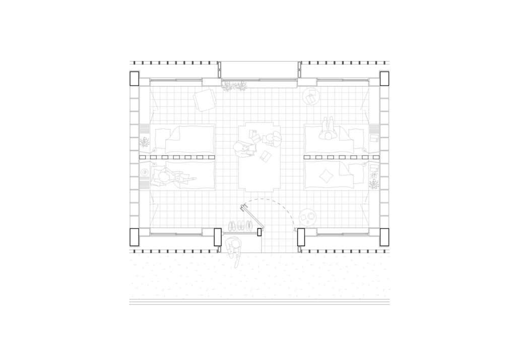 Architectural layout drawing of a typical four-bed student dorm room showing bed placement, study areas, and entry.