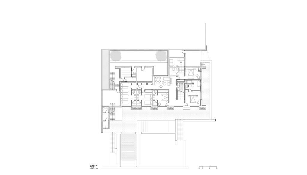 Architectural floor plan drawing of the lower level (Piso 1) of Casa Zapallar showing bedroom layouts, service areas, and stone base boundaries.