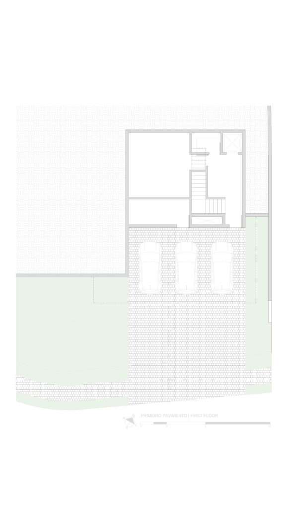 Architectural drawing of the first floor plan of Casa da Mata indicating the lower garage parking layout, stairs, and service areas.