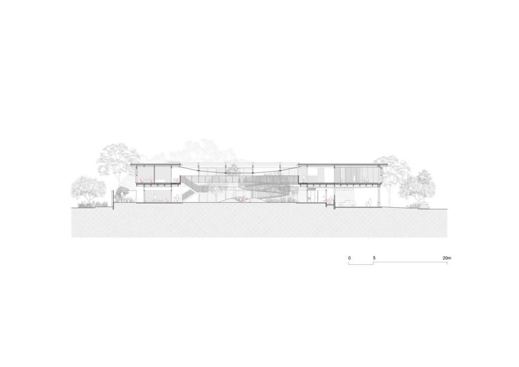 Architectural longitudinal section drawing AA illustrating the two-story building height, central covered courtyard, and spiral ramp elevation.