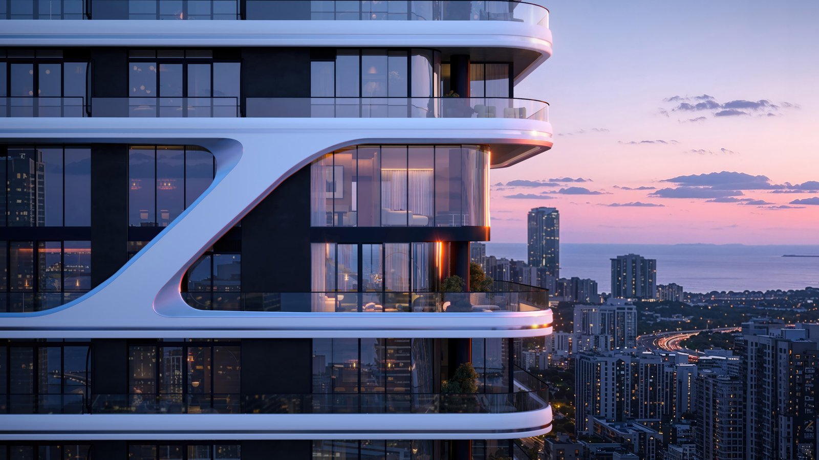 Architectural detail showing curved white horizontal balcony bands, fenestration, and glazed enclosures against a dusk sky.