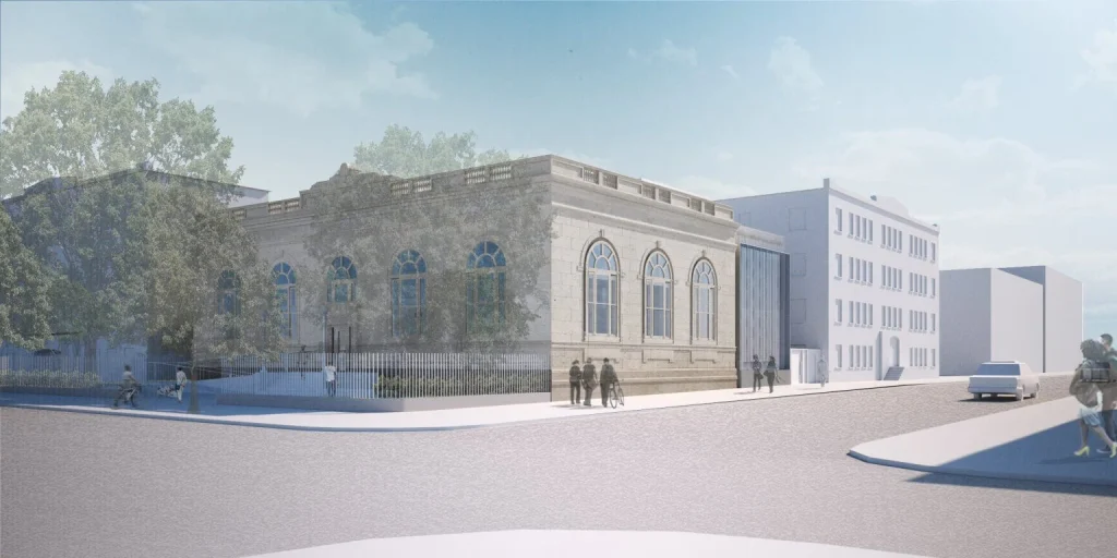 Corner perspective view of the Carnegie library building and the adjacent new glass wing