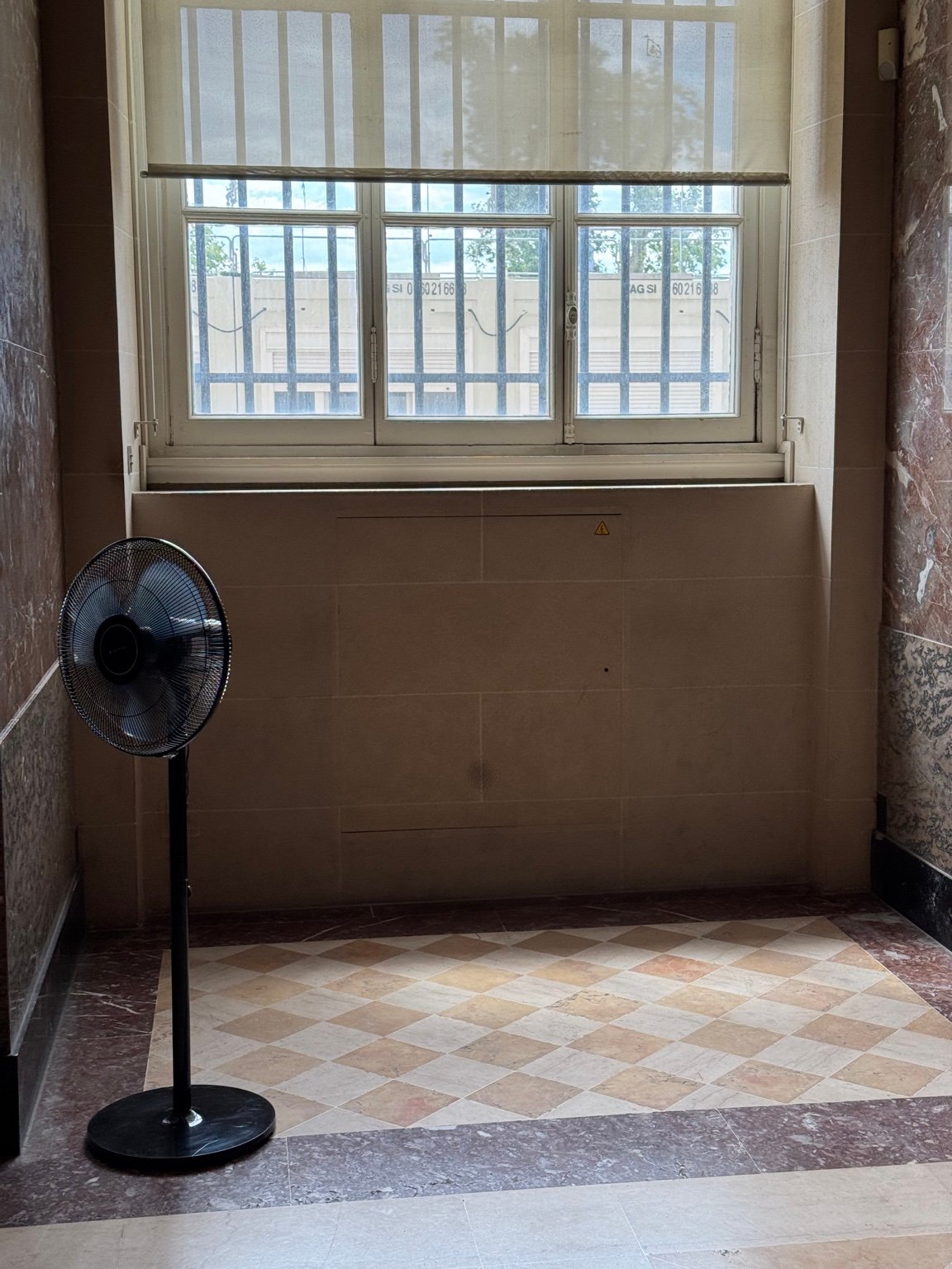 Interior area at the Louvre raising questions about ventilation, heat, and environmental comfort.