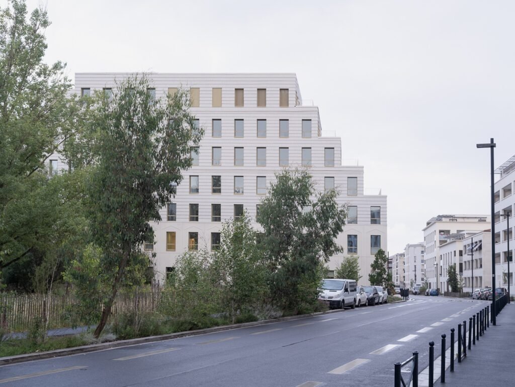 Urban context view of Donnan Health Center with stepped volume along the street in Bordeaux.