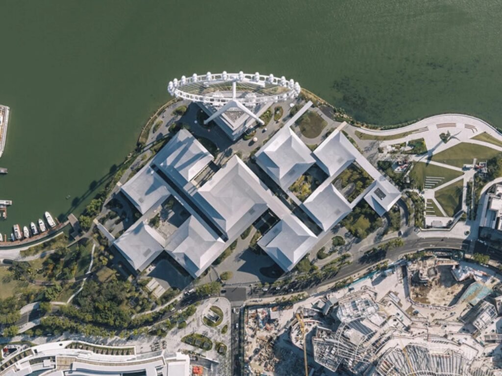 Straight-down top-view aerial photograph of the 12 pavilion roofs and interconnected corridors near Jinji Lake.