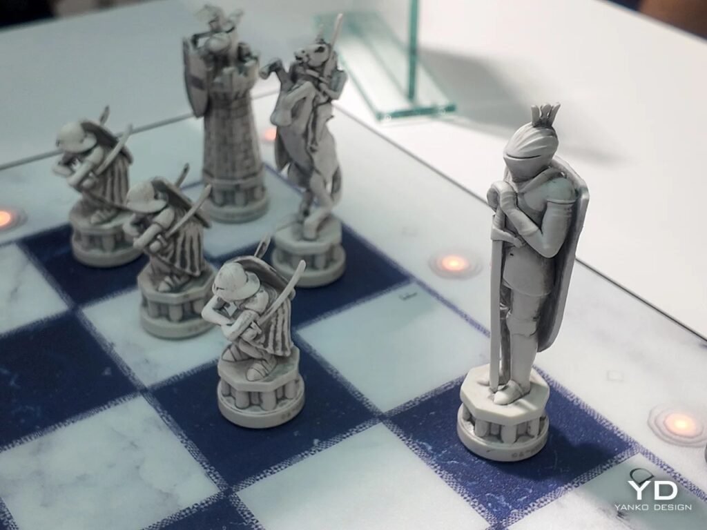 Profile angle of an armored king and pawn chess pieces arrayed across an illuminated board.