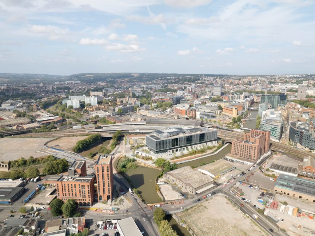 Aerial view of Bristol urban context showing Temple Quarter Enterprise Campus, railway lines, and river bend.