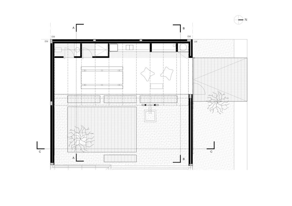 Architectural floor plan of Quincho project showing dining area, barbecue zone, lawn, and boundary walls.