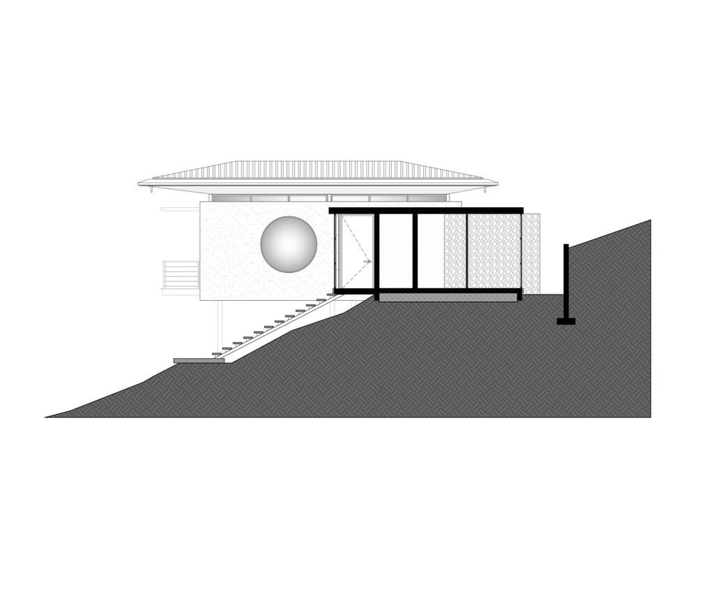 Architectural elevation drawing showing the building profile, circular window, and sloping ground line.