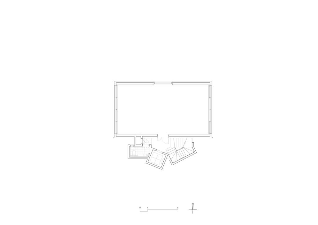 Second-floor architectural floor plan drawing showing rectangular rental unit and angled core service layout.