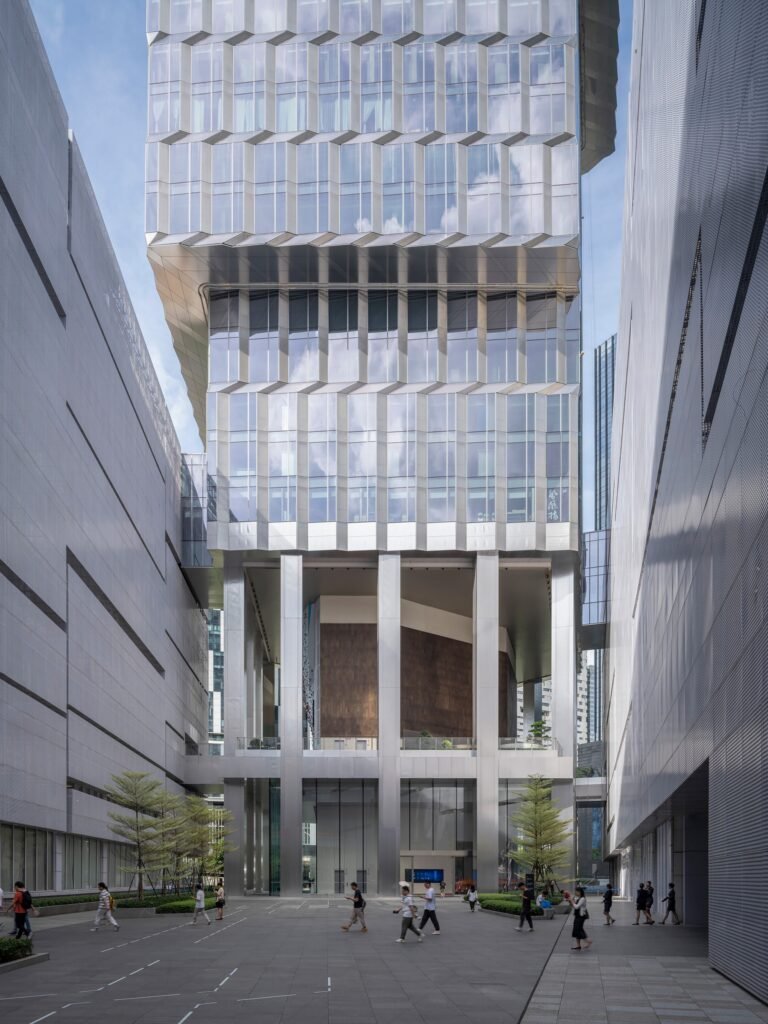 Courtyard view looking up at the Kingdee HQ Tower positioned tightly between two existing office wings.