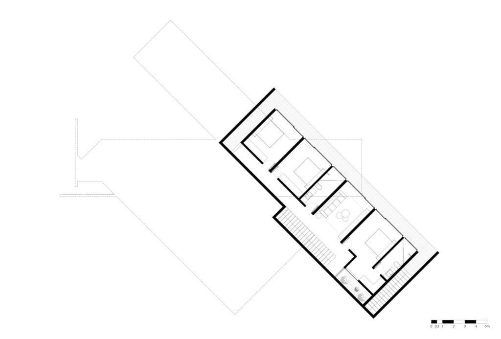 Black and white architectural floor plan of the lower level (Level -1) of Casa 22, illustrating linear bedroom layouts and staircases integrated into the sloping terrain with a scale bar at the bottom right.