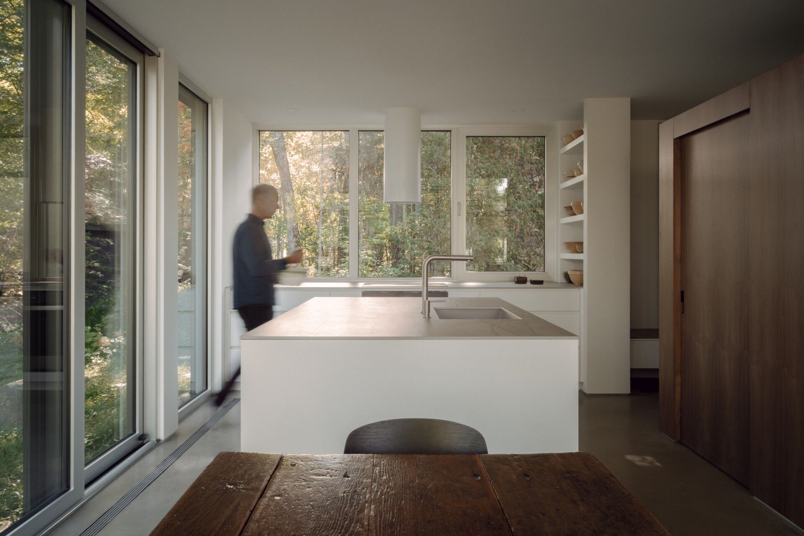 Kitchen and freestanding service volume at Chalet Moraine