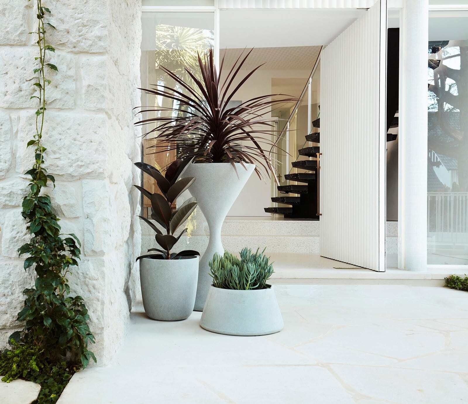 Large white pivot door at the Bellevue Hill house