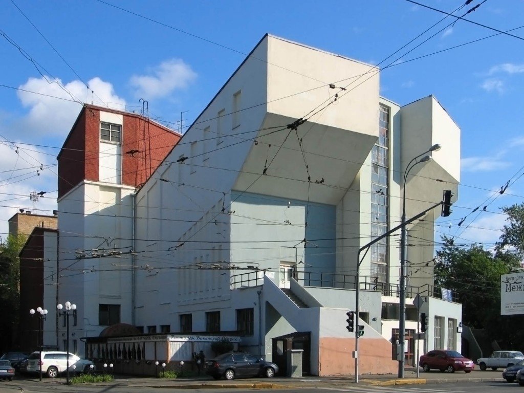 Street view of the projecting seating volumes and glazed bays