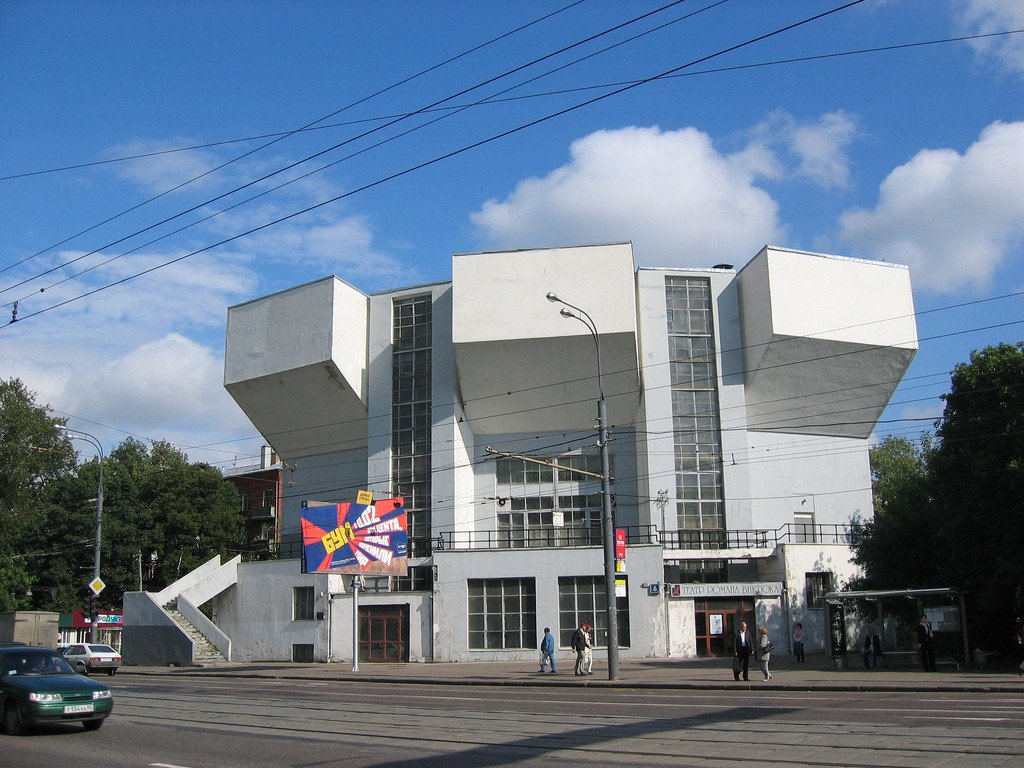 Street view of the projecting seating volumes and glazed bays