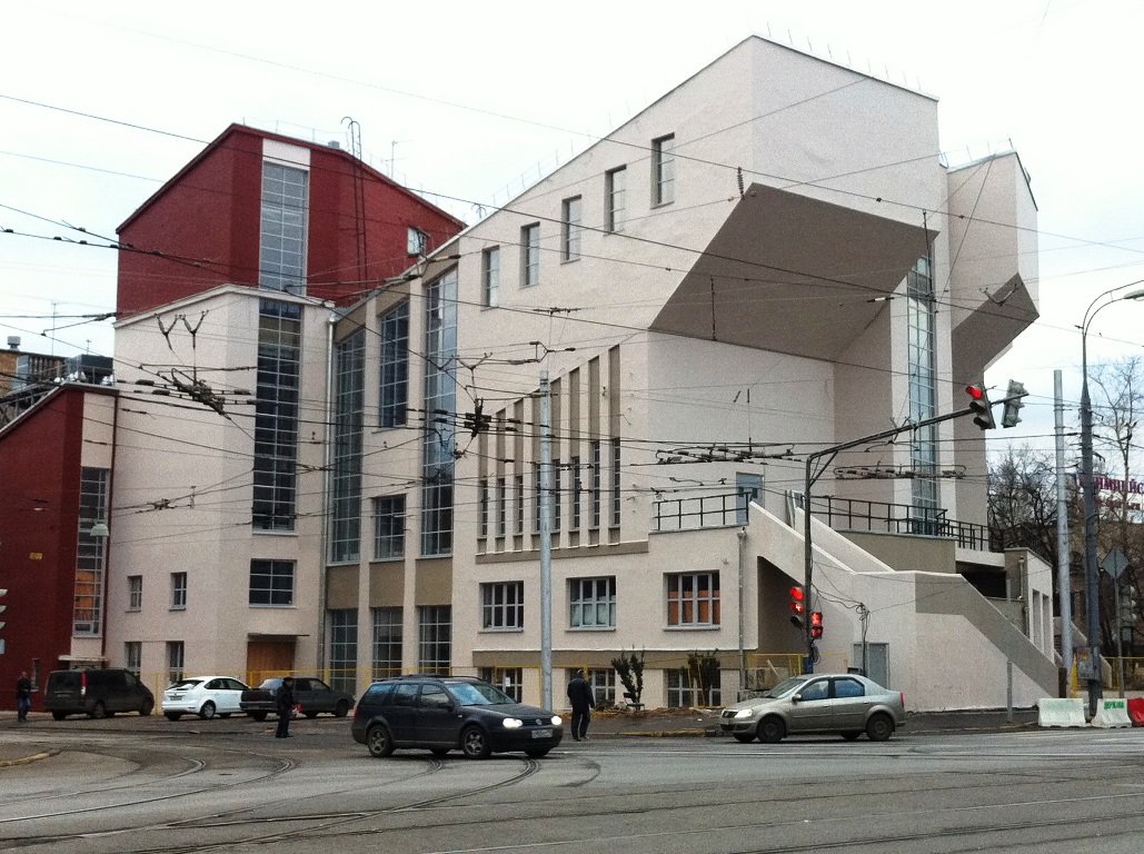 Street view of the projecting seating volumes and glazed bays