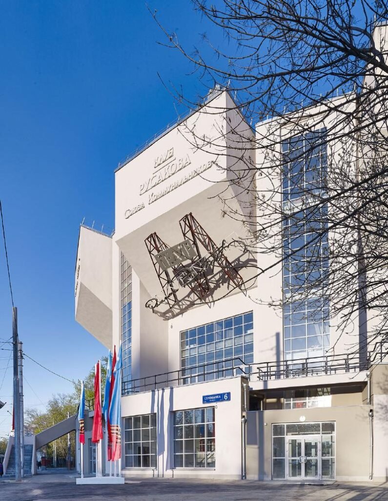 Street view of the projecting seating volumes and glazed bays