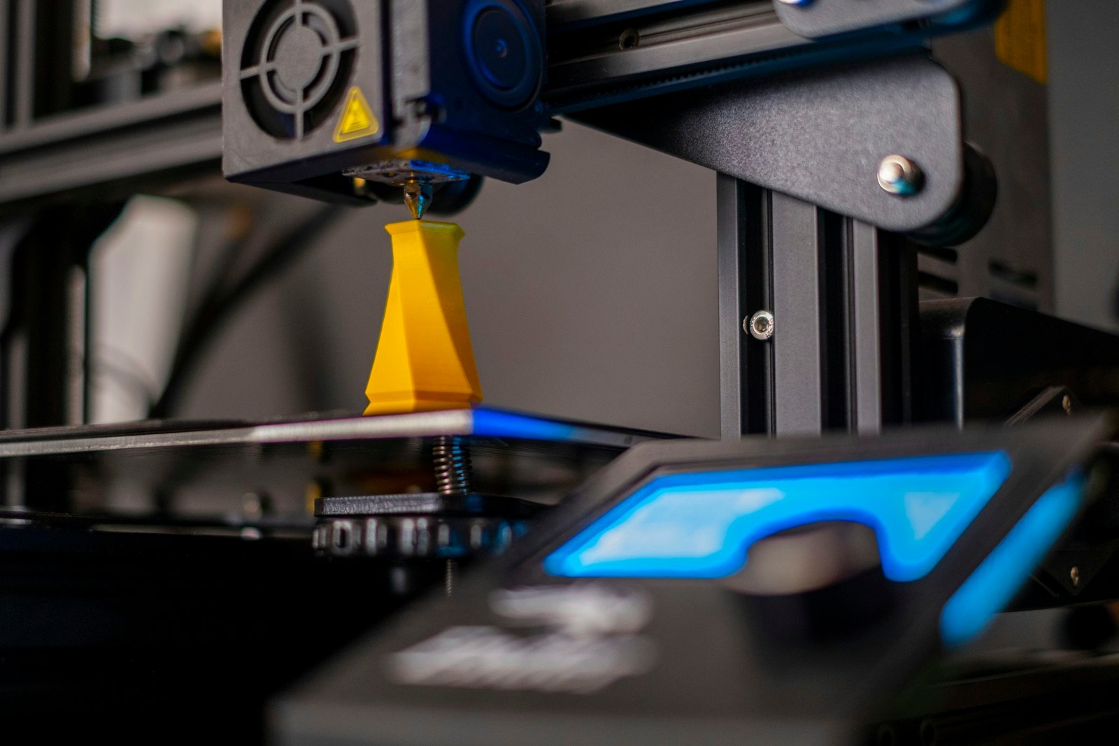 Illustrative photograph of 3D printing, not an image of the InstructMesh research experiment