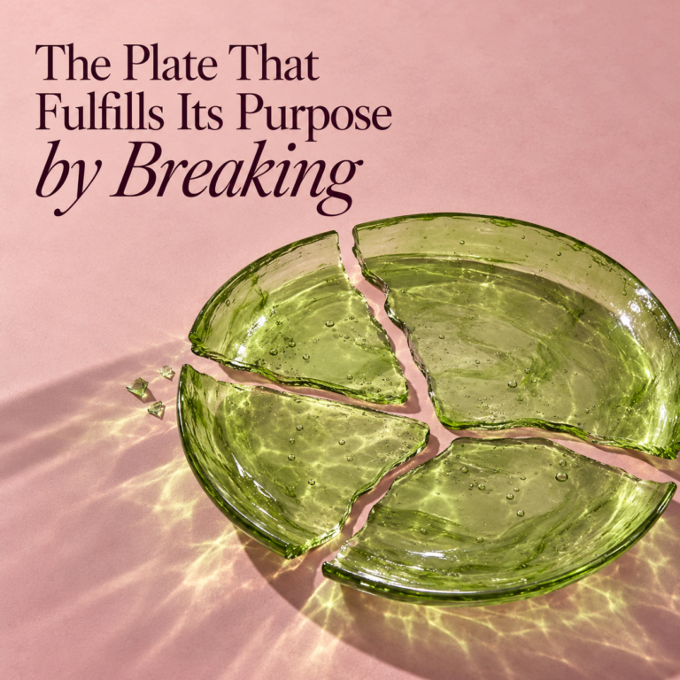 A green glass plate broken into several pieces casts patterned light on a pink surface beneath the article title.