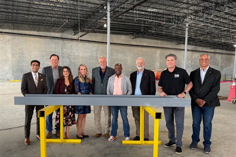 Topping-out ceremony inside the E-Space headquarters construction site in Arlington