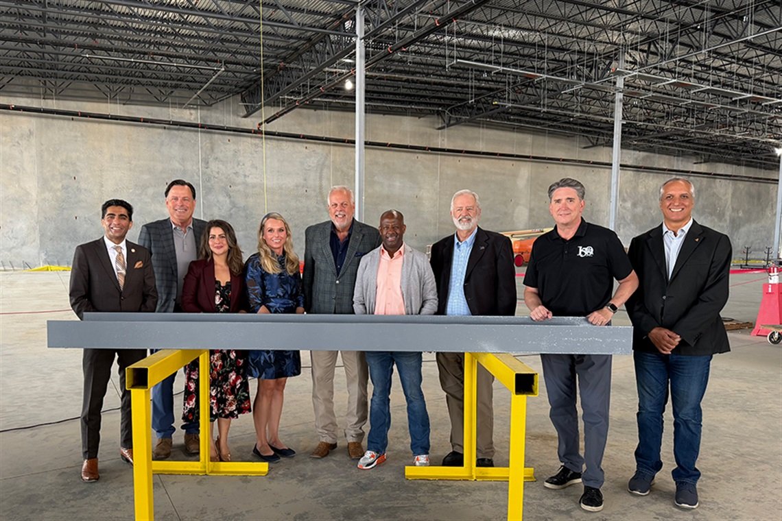 Topping-out ceremony inside the E-Space headquarters construction site in Arlington