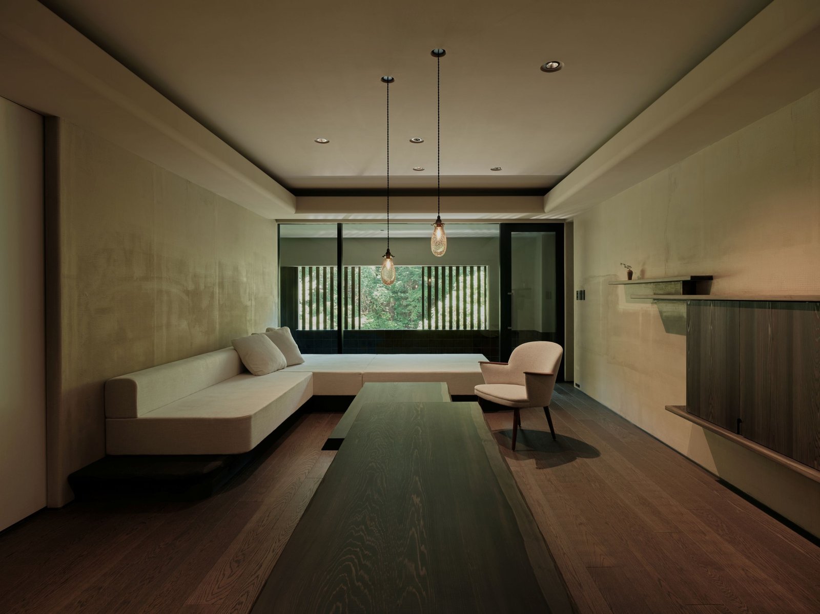 One of five Simplicity-designed suites combines low furniture with stone, mortar and washi.