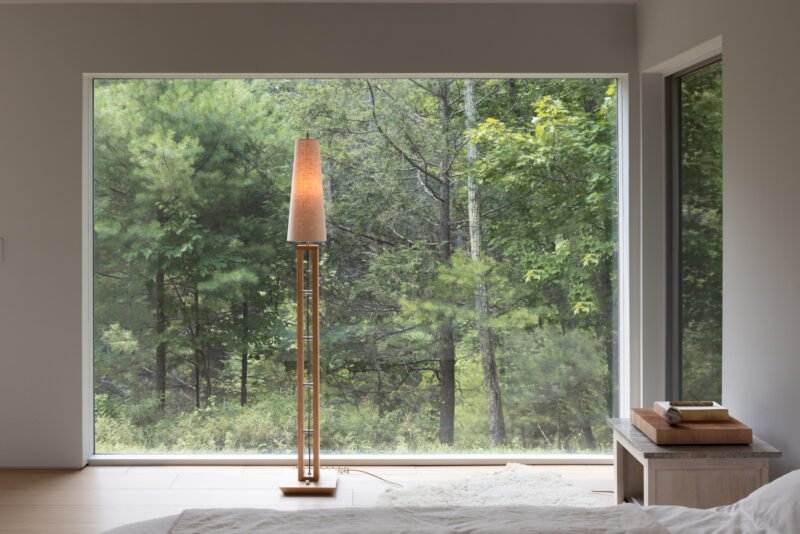 Strut floor light: timber framework and a linen shade