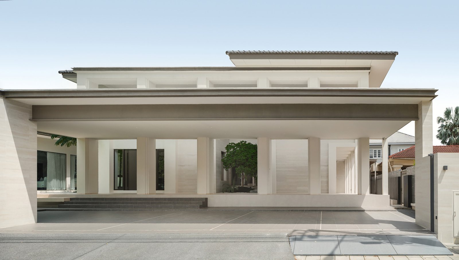 Renovated fa&ccedil;ade opening toward the central garden