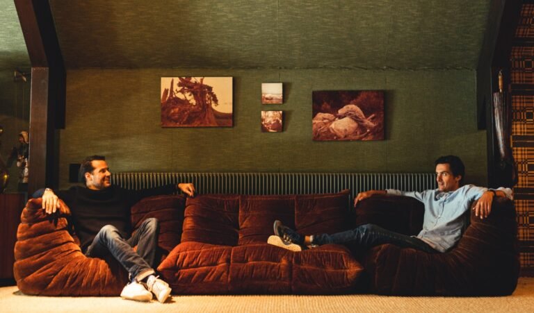 Antoine and Olivier Roset seated on a Togo sofa