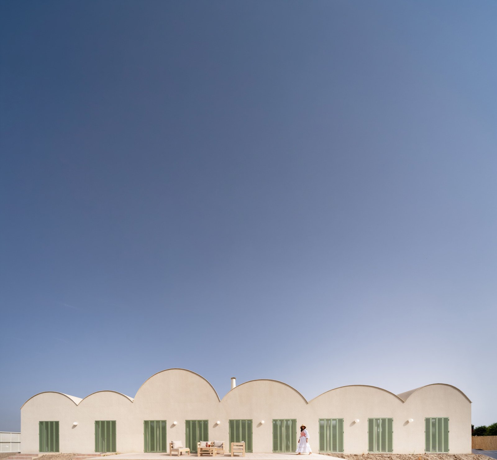 The exterior establishes the relation between the vaults, shutters and garden.